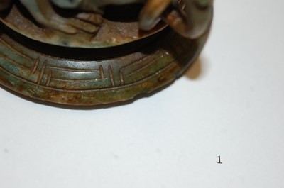 Lot 258 - * A Chinese carved jadeite covered jar and...