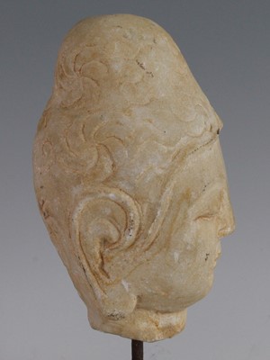 Lot 263 - * A Chinese carved marble head of the Buddha,...
