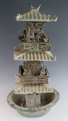 Lot 265 - * A Chinese glazed pottery three tier...