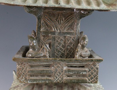 Lot 265 - * A Chinese glazed pottery three tier...