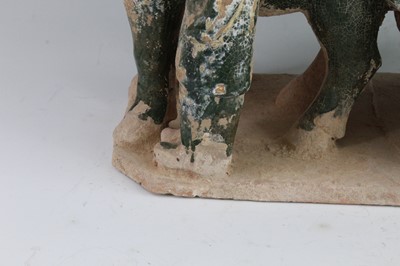 Lot 44 - A Chinese green glazed terracotta Mingqi cart,...