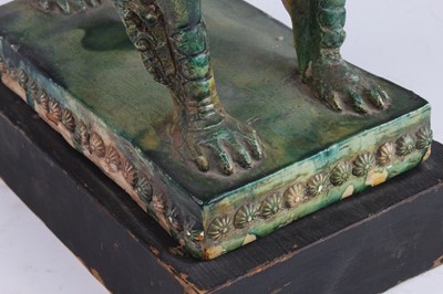 Lot 1 - A Chinese green glazed pottery figure of a Fu...