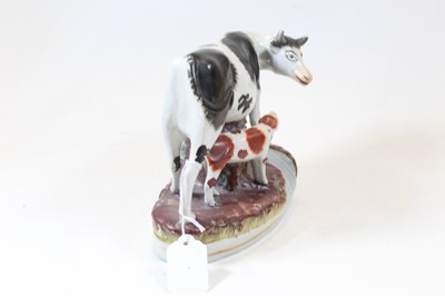 Lot 4 - A 19th century Staffordshire model of a cow...