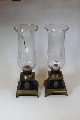 Lot 14 - A pair of 20th century brass and glass storm...