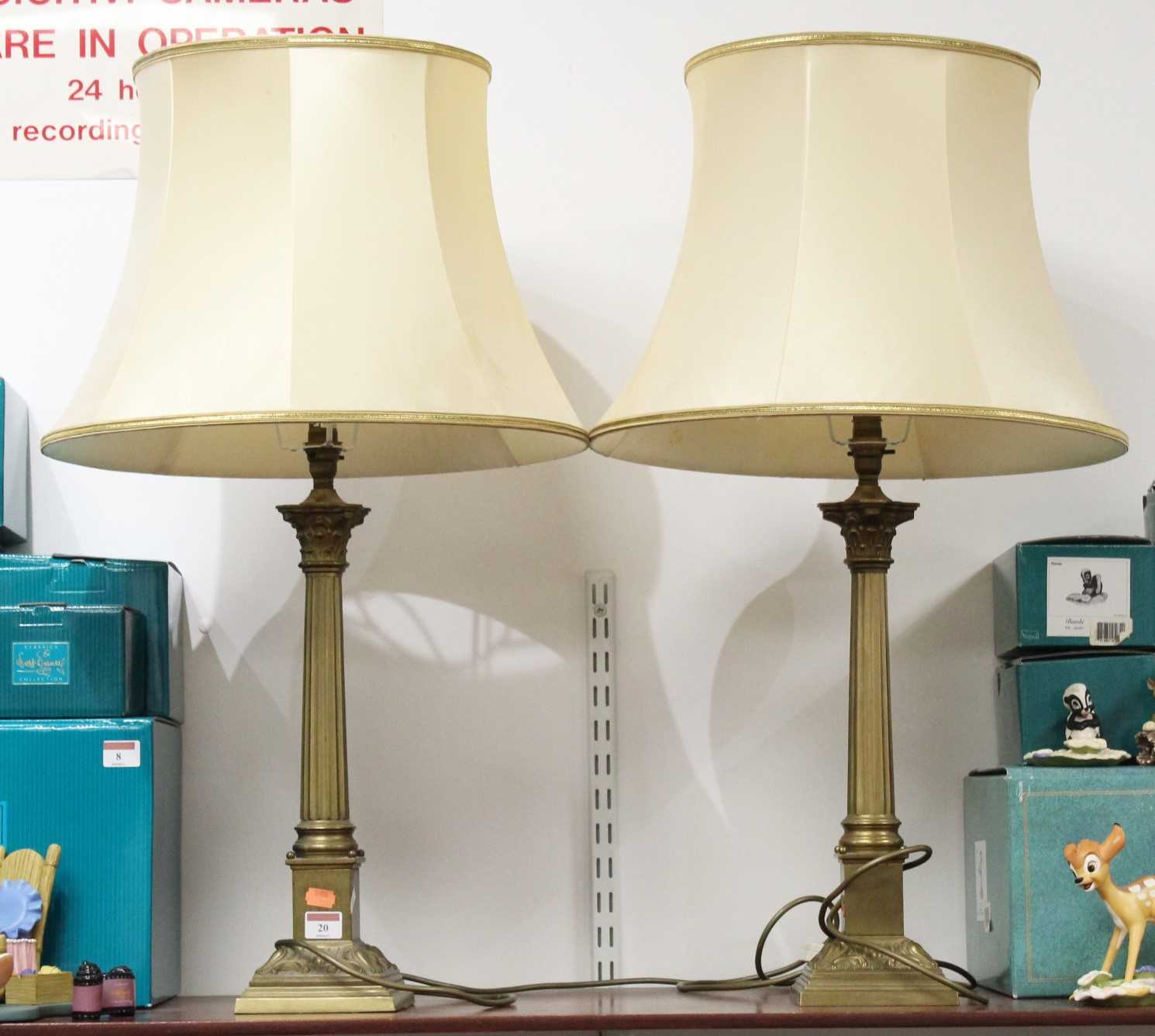 Lot 20 - A pair of 20th century brass table lamps, in...