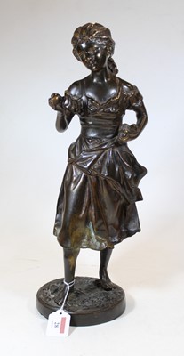 Lot 28 - A 20th century bronze figure of a young girl,...