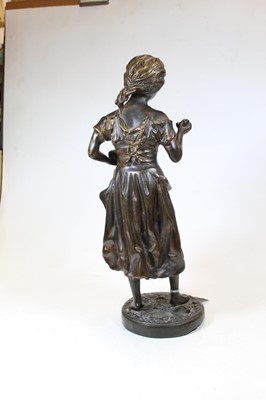 Lot 28 - A 20th century bronze figure of a young girl,...
