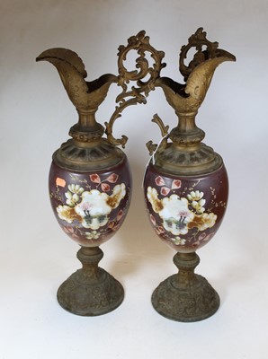 Lot 29 - A pair of 20th century gilt painted metal and...