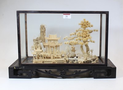 Lot 31 - A 20th century Japanese carved cork model...