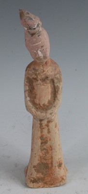Lot 276 - * A Chinese pottery figure, modelled as a...