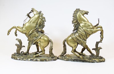 Lot 37 - A pair of late 19th/early 20th century brass...