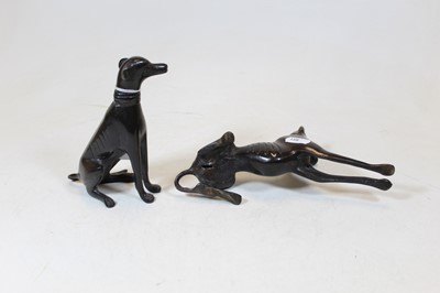Lot 44 - A bronze model of a seated greyhound, h.14cm;...