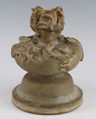 Lot 279 - * A Chinese pottery vase, the body modelled as...