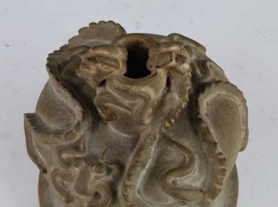 Lot 54 - A Chinese pottery vase, the body modelled as...