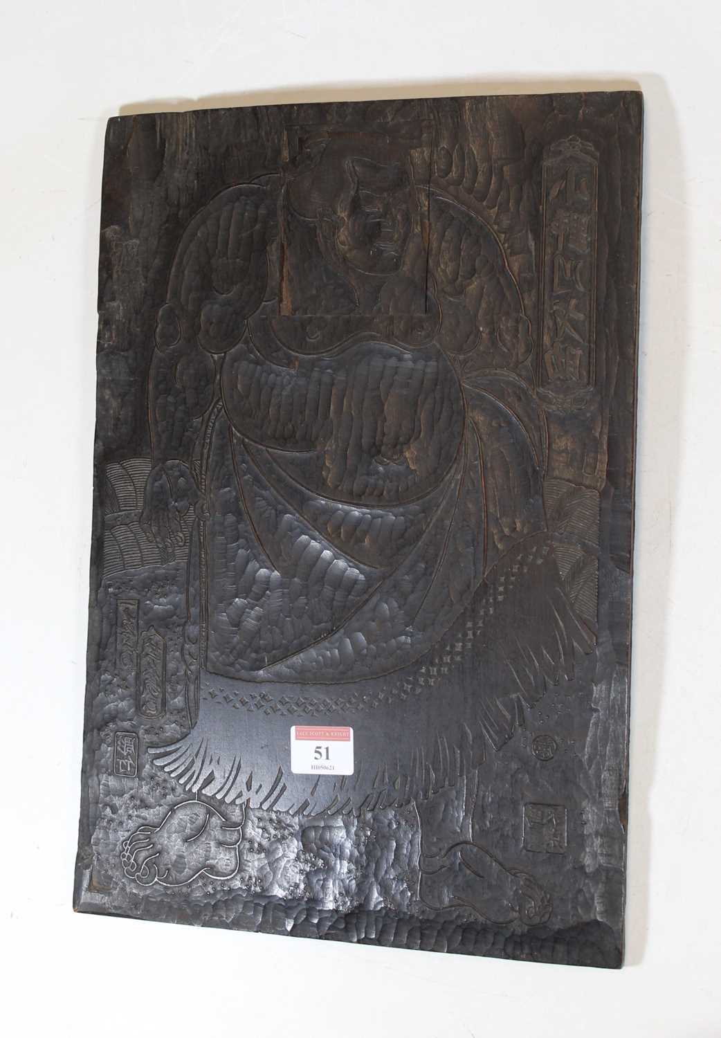 Lot 51 - A Japanese carved woodblock, decorated with a...