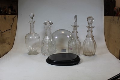 Lot 53 - A small Victorian glass dome on an ebonised...