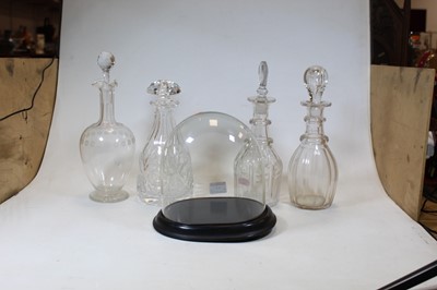Lot 53 - A small Victorian glass dome on an ebonised...