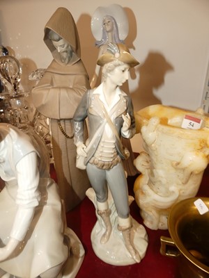 Lot 55 - A Lladro Spanish porcelain figure of a seated...