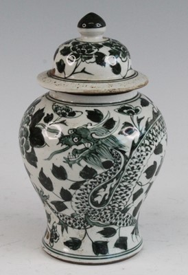 Lot 283 - * A Chinese ceramic vase and cover, the domed...