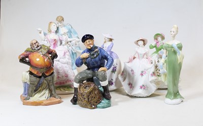 Lot 72 - A collection of porcelain figures, to include...