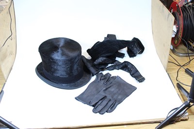 Lot 145 - A 20th century moleskin top-hat, bearing label...