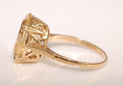 Lot 2505 - A yellow metal citrine dress ring, featuring...