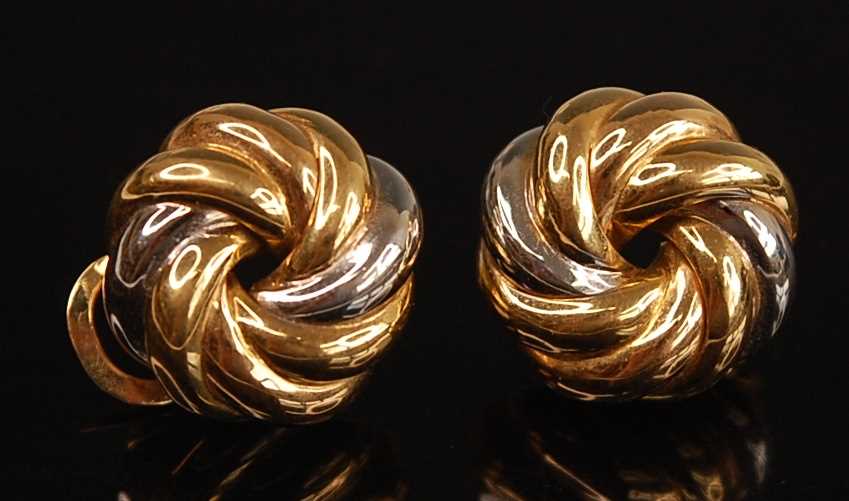 Lot 2513 - A pair of yellow and white metal eight strand...