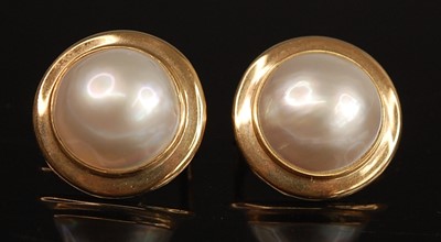 Lot 2514 - A pair of 9ct yellow gold pearl earrings, each...