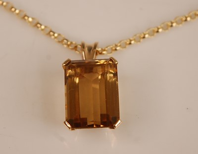 Lot 2515 - A yellow metal citrine pendant, comprising a...