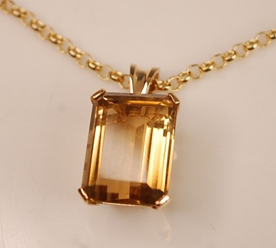 Lot 2515 - A yellow metal citrine pendant, comprising a...