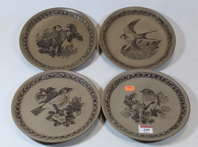 Lot 249 - A set of four Poole Pottery stoneware plates...