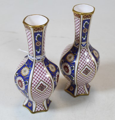 Lot 264 - A pair of Aynsley vases of hexagonal form...