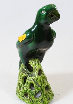 Lot 271 - An early 20th century green glazed pottery...