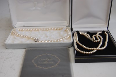 Lot 321 - A Pompadour faux pearl two string choker with...
