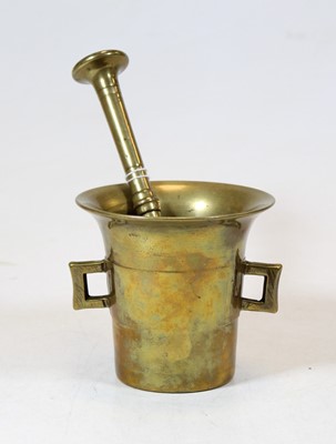 Lot 56 - A bronze pestle and mortar