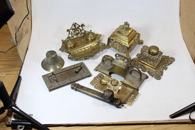 Lot 92 - A Victorian brass inkwell, the hinged square...