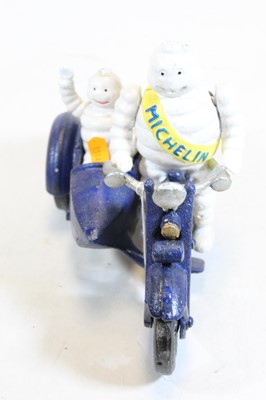 Lot 631 - A cast iron MIchelin man advertising figure on...