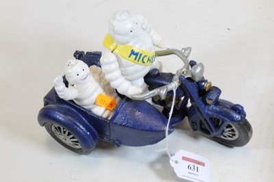 Lot 631 - A cast iron MIchelin man advertising figure on...