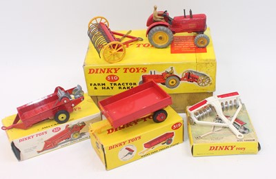 Lot 1423 - A group of 4 boxed Dinky farm items all boxed...