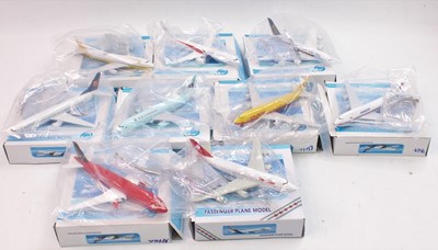 Lot 2060 - A group of 9 boxed diecast Passenger Plane...