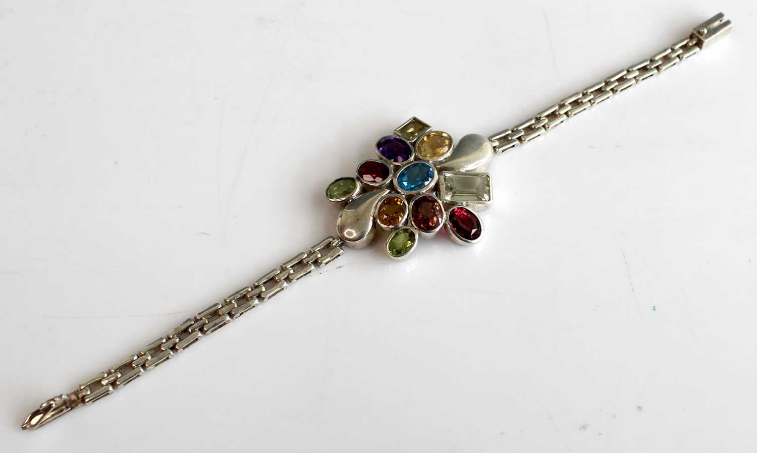 Lot 2532 - A sterling silver brick link bracelet, having...