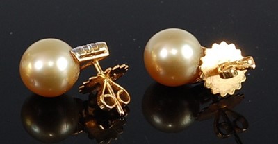 Lot 2518 - A pair of yellow metal pearl and diamond drop...
