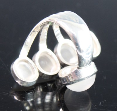 Lot 2534 - A sterling silver moonstone multi-stone...