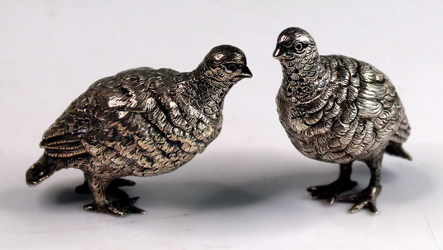 Lot 1040 - A pair of Victorian novelty silver salt and...