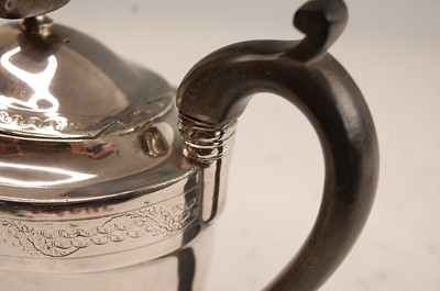 Lot 1037 - A George III silver teapot and stand, the...