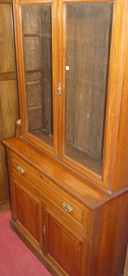 Lot 1128 - A late Victorian walnut secretaire bookcase,...