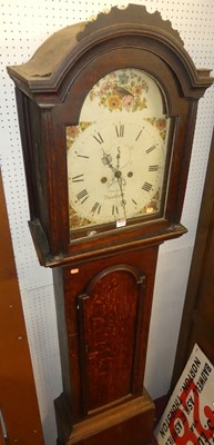 Lot 1130 - A circa 1800 provincial oak longcase clock,...