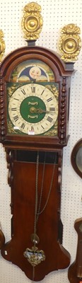 Lot 1137 - A Dutch hanging wall clock, having embossed...