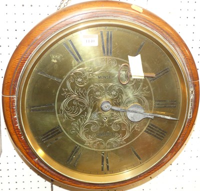 Lot 1140 - A Victorian pitched pine circular wall clock,...