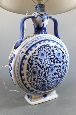 Lot 51 - A Chinese export stoneware blue & white moon...